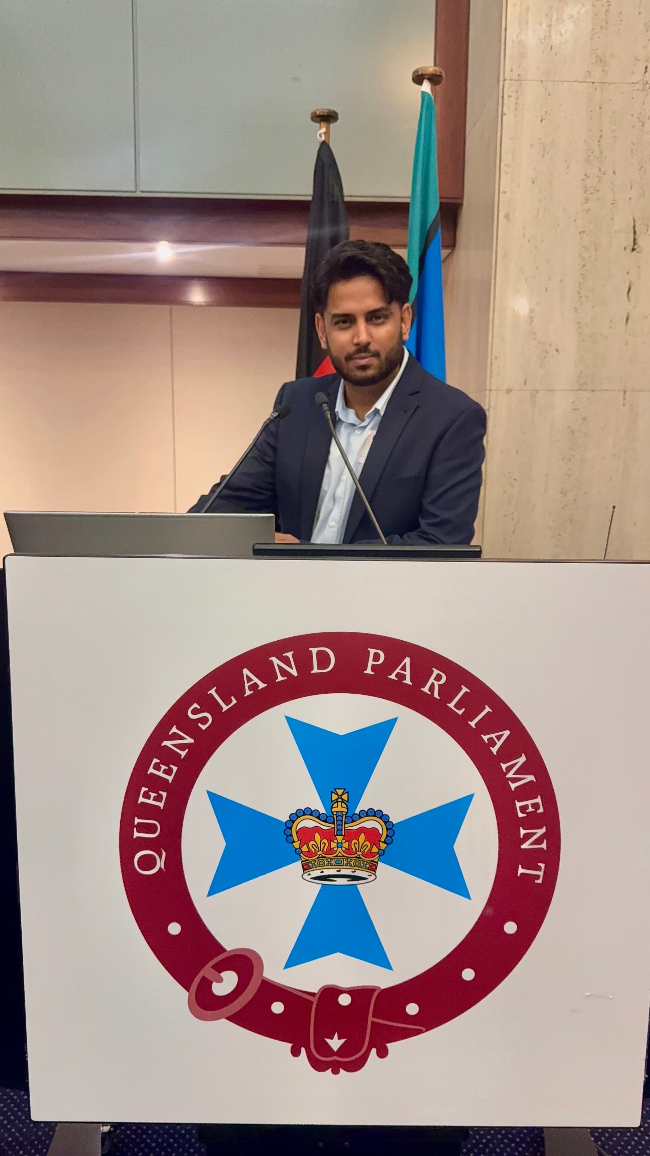 Babbal Khehra at the Queensland Parliament podium